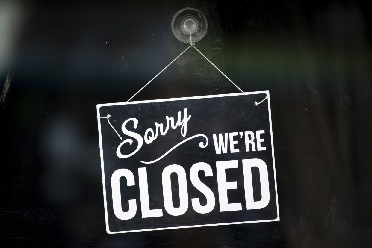 A closed sign in the window of a small business on May 19, 2020 in Cardiff, United Kingdom.