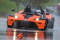 <p>Even the standard car, with 295 horsepower and the manual gearbox, flies through the gears. Not only is it properly quick-zero to 60 mph in a claimed 3.9 seconds, although we did a 3.6-second dash in 2009 with a 237-hp X-Bow-the sensation of speed is heightened by the cheeks-on-the-tarmac seating position, the lack of a windshield, the barking exhaust, and because you're wearing a helmet.</p>