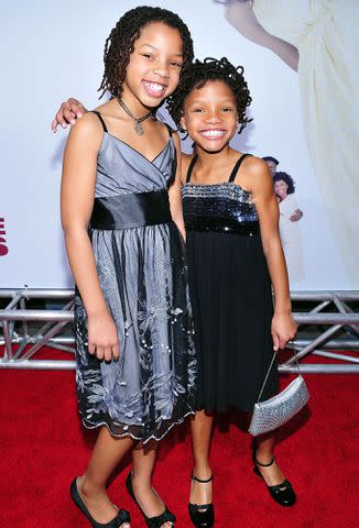 <p>Michael Tullberg/Getty</p> Chloe Bailey and Halle Bailey on the red carpet at the premiere of "Meet The Browns" in March 2008 in Los Angeles, California