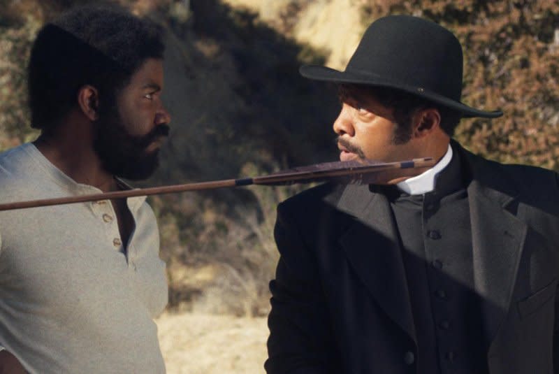 Johnny Black (Michael Jai White, L) meets preacher Percival (Byron Minns). Photo courtesy of Samuel Goldwyn Films