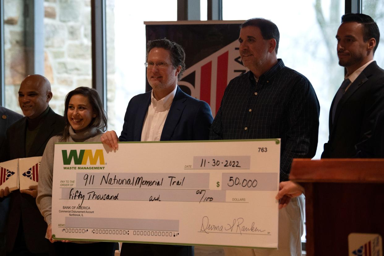 Waste Management presents a 50,000-dollar check to the September 11th National Memorial Trail Alliance at Washington Crossing State Park Visitor Center in Washington Crossing on Wednesday, Nov. 30, 2022.