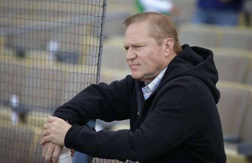 Sports agent Scott Boras watches the Miami Marlins players practice before a baseball game against the Los Angeles Dodgers, Monday, May 11, 2015, in Los Angeles. (AP Photo/Jae C. Hong) ORG XMIT: NYOTK ** Usable by LA and DC Only **