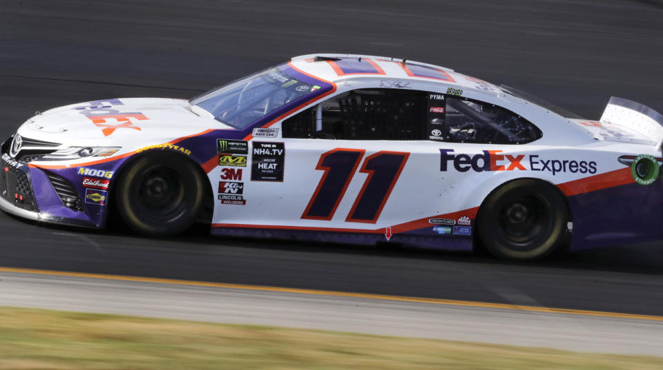 Denny Hamlin heads down the front straight during a NASCAR Cup Series auto race at New Hampshire Motor Speedway in Loudon, N.H., Sunday, July 21, 2019. (AP Photo/Charles Krupa)