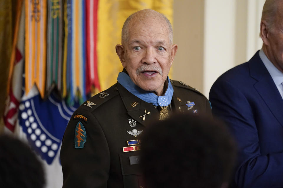 Retired Army Col. Paris Davis stands with President Joe Biden after he was awarded the Medal of Honor for his heroism during the Vietnam War, in the East Room of the White House, Friday, March 3, 2023, in Washington. Davis, then a captain and commander with the 5th Special Forces Group, engaged in nearly continuous combat during a pre-dawn raid on a North Vietnamese army camp in the village of Bong Son in Binh Dinh province. (AP Photo/Evan Vucci)