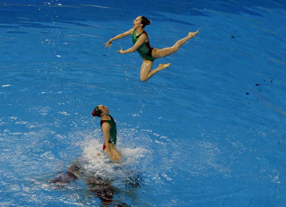 Japan's team performs in the Teams Free Combination synchronised swimming final during the 17th Asian Games in Incheon