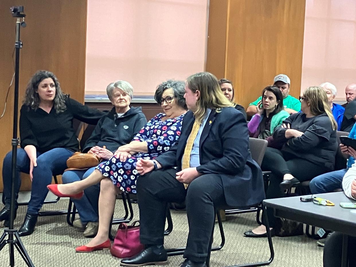 Green Bay City Council Member-elect Joey Prestley, center, speaks with residents during the City Council meeting Tuesday. Prestley could not take the oath of office while his District 6 opponent can still appeal the results of the April 12 recount.