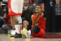 Atlanta Hawks guard Trae Young looks to a referee for a call during the second half of an NBA basketball game against the Houston Rockets, Wednesday, Jan. 8, 2020, in Atlanta. Houston won 122-115. (AP Photo/John Amis)