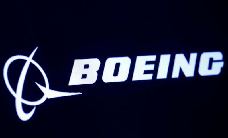 FILE PHOTO: The company logo for Boeing is displayed on a screen on the floor of the NYSE in New York