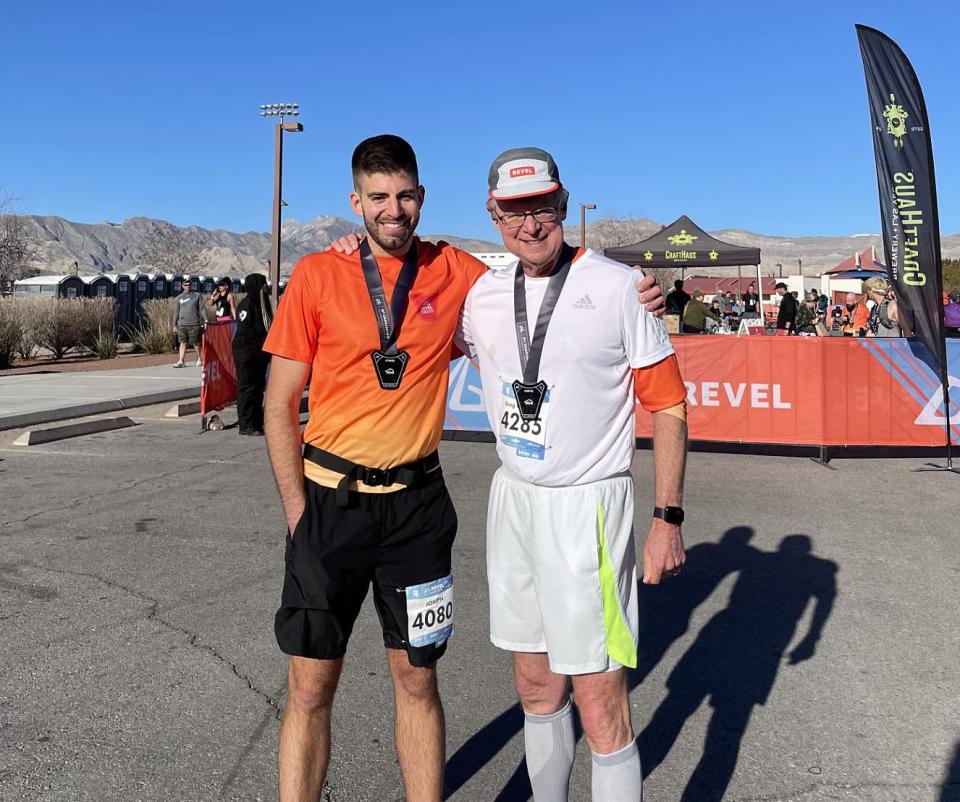 Greg Woodman, right, poses with his son, Joe, after they ran in the Las Vegas Half Marathon on April 1. Greg Woodman, a 65-year-old State College resident, has recovered from cardiac arrest he suffered while running the Presque Isle Half Marathon on July 16.