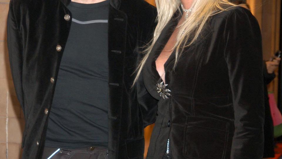 Gary Numan and wife Gemma in matching black outfits