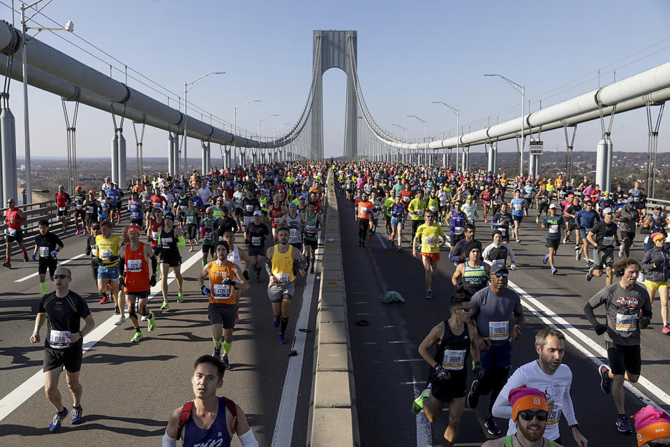 Runners make their way across the Verrazzano-Narrows Bridge during the start of the New York City Marathon,  Nov. 3, 2019, in New York. (Photo: Julius Motal/AP)