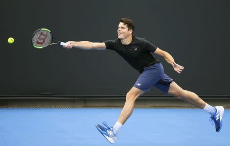 Canada's Milos Raonic hits a shot during a training session ahead of the Australian Open tennis tournament in Melbourne, Australia, January 15, 2017. REUTERS/Edgar Su