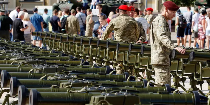 An Ukrainian soldier looks on anti-tank missile complexes Stugna-P, handed over from the Ukrainian President to the Armed Forces, during an exhibition of Ukrainian military vehicles, opened to the Independence Day, in central Kiev, Ukraine, 23 August, 2018.