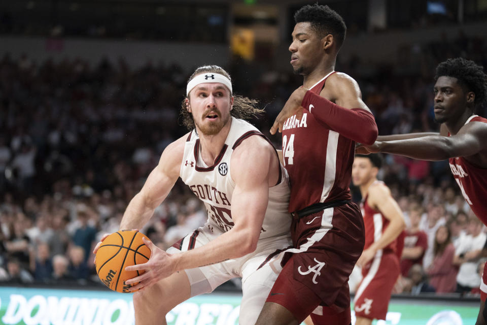 South Carolina forward Hayden Brown (10) looks for a shot against Alabama forward Brandon Miller (24) during the second half of an NCAA college basketball game Wednesday, Feb. 22, 2023, in Columbia, S.C. Alabama won 78-76 in overtime. (AP Photo/Sean Rayford)