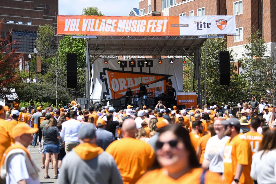 Fans mingle before Tennessee football’s Orange & White spring game, in Neyland Stadium on April 15.