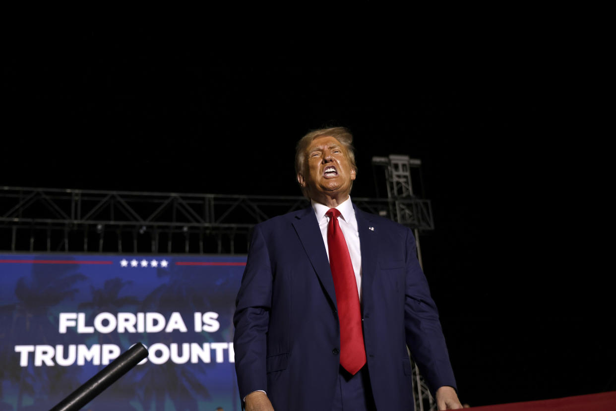  Donald Trump on stage at Florida rally. 