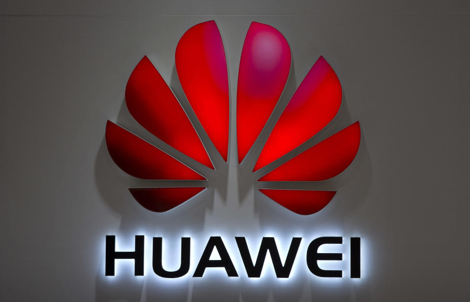 FILE - In this July 4, 2018, file photo, the Huawei logo is seen in a shopping mall in Beijing. China’s latest propaganda broadside in its trade war with the U.S. features an unusual star: Trevor Noah of the Daily Show. A recent clip from the popular comedy tv show discussing Chinese equipment maker Huawei’s dominance in 5G mobile technology ran on Chinese state broadcaster CCTV’s national lunchtime news on Monday as part of a package of stories attacking the U.S. position in the ongoing trade war. (AP Photo/Mark Schiefelbein, File)