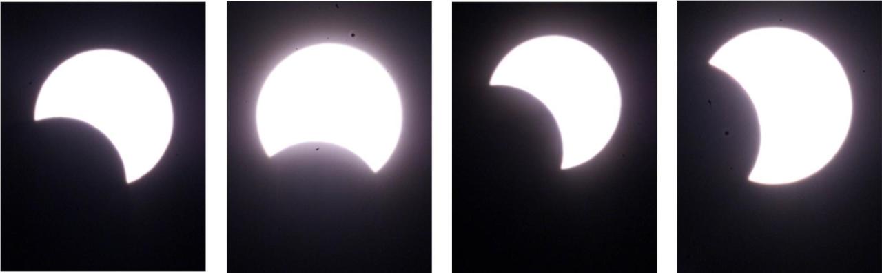 The moon slowly moves over the sun during an eclipse in Vancouver on Monday, June 10, 2002. The eclipse is seen at 17:15 PST, left to right,  17:30, 18:01 and 18:26. The eclipse peaked at 18:01 PST, covering 30 percent of the sun. (CP PHOTO/Richard Lam)