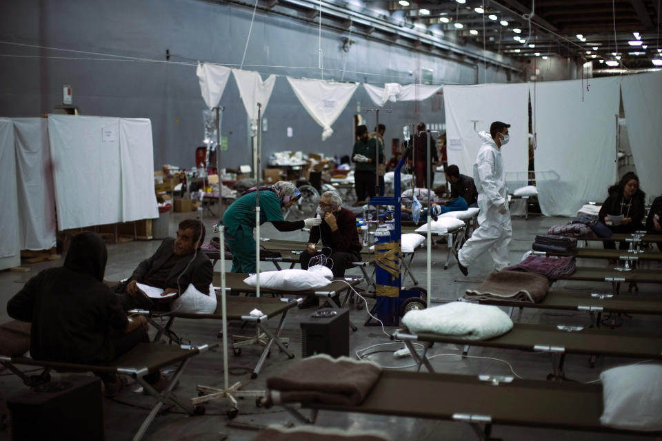 Patients affected by the earthquake are seen by medical personnel in a makeshift hospital set up at Turkish Bayraktar warship anchored in a port near Iskenderun city, southern Turkey, Tuesday, Feb. 14, 2023. Thousands left homeless by a massive earthquake that struck Turkey and Syria a week ago packed into crowded tents or lined up in the streets for hot meals as the desperate search for survivors entered what was likely its last hours. (AP Photo/Francisco Seco)