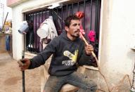 A Lebanese villager, Kamal al-Ahmad, who claims that Israeli soldiers took cows he owned, is pictured in the village of Wazzani