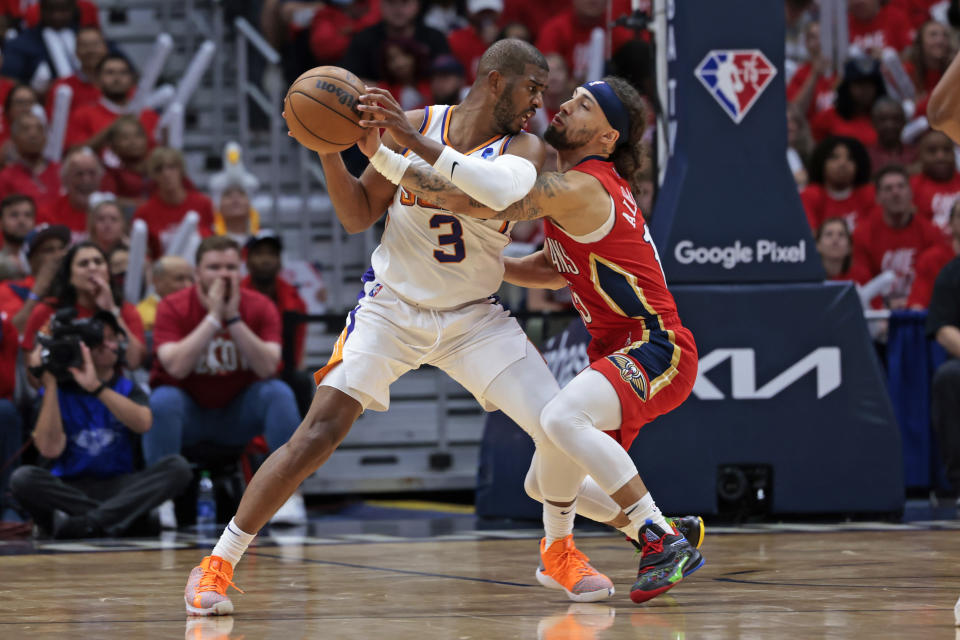 Phoenix Suns guard Chris Paul (3) is fouled by New Orleans Pelicans guard Jose Alvarado during the first half of Game 3 of an NBA basketball first-round playoff series in New Orleans, Friday, April 22, 2022. (AP Photo/Michael DeMocker)