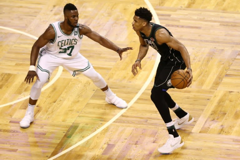 Semi Ojeleye of the Boston Celtics defends Giannis Antetokounmpo of the Milwaukee Bucks as Boston took a 3-2 series lead with a 92-87 win