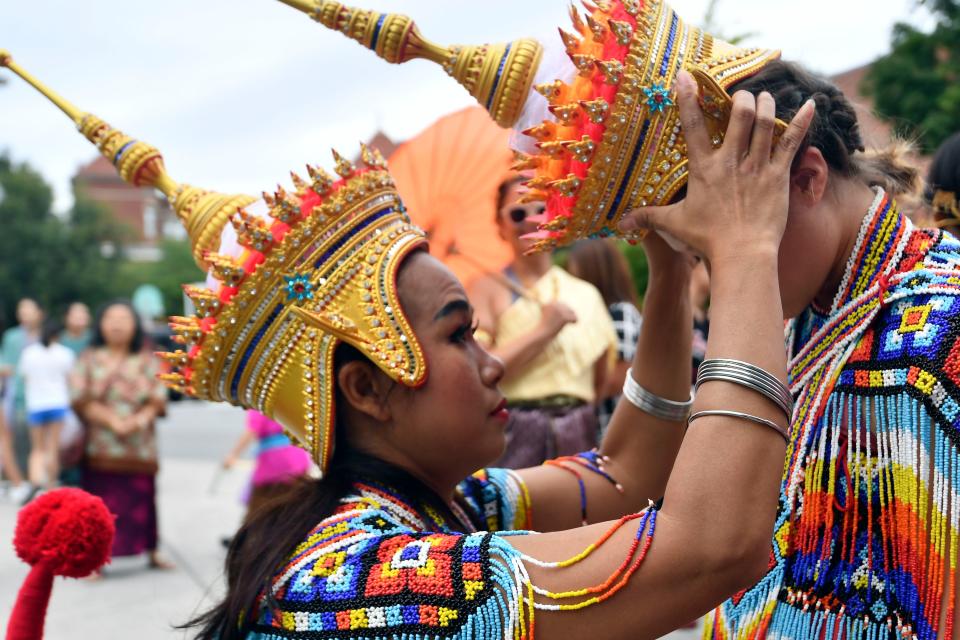 Parade attendants for Thailand get ready for their procession through World's Fair Park on Sunday, August 25, 2019 during Knox Asian Fest. 