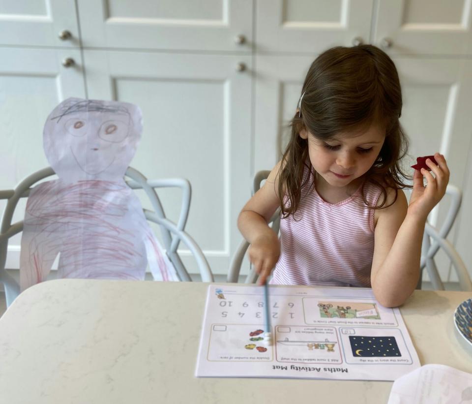 "Never without her grandma": This image by Melanie Lowis of London shows 5-year-old Millie, who made a cutout of her beloved 73-year-old grandmother, a retired teacher, to partner with her on home schooling. "When lockdown ends, and the real grandma can return, it will be a very happy and emotional reunion," Lowis wrote.