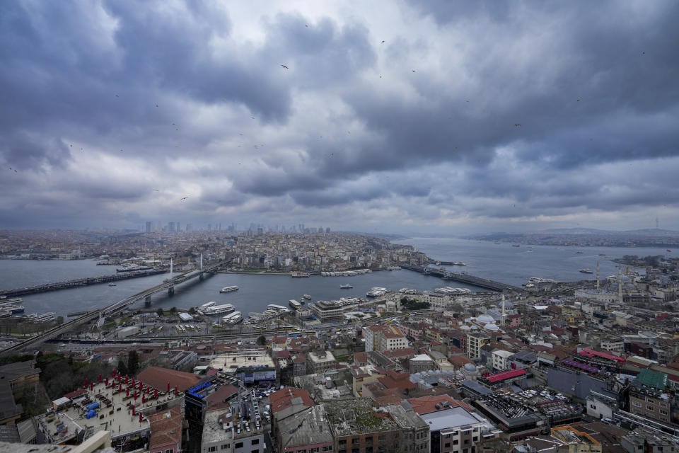 Ferry boats sail the Bosphorus connecting the European side, up and bottom, with the Asian side, top right, of Istanbul, Turkey, Wednesday, March 6, 2024. (AP Photo/Emrah Gurel)