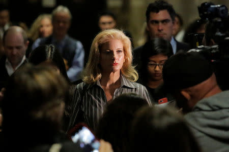 Summer Zervos, a former contestant on The Apprentice, leaves New York State Supreme Court with attorney Gloria Allred (not pictured) after a hearing on the defamation case against U.S. President Donald Trump in Manhattan, New York City, U.S., December 5, 2017. REUTERS/Andrew Kelly