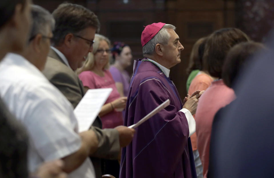 Bishop Ronald Gainer, of the Harrisburg Diocese, arrives to celebrate mass at the Cathedral Church of Saint Patrick in Harrisburg, Pa., Friday, Aug. 17, 2018. Gainer, who's named in a grand jury report on rampant sexual abuse by Roman Catholic clergy is celebrating a Mass of forgiveness, as the Vatican expresses "shame and sorrow" over the burgeoning scandal. (AP Photo/Matt Rourke)