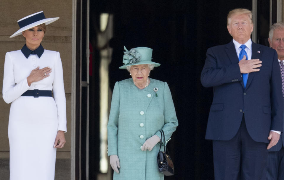 LONDON, ENGLAND - JUNE 03: Queen Elizabeth II with U.S. President Donald Trump and First Lady Melania Trump during the Ceremonial Welcome in the Buckingham Palace Garden on June 3, 2019 in London, England. (Photo by Mark Cuthbert/UK Press via Getty Images)