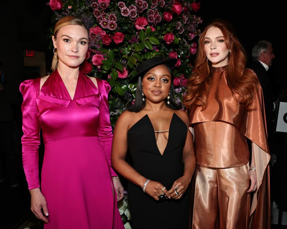 (L-R) Julia Stiles, Quinta Brunson, and Lindsay Lohan attend the Christian Siriano Fall/Winter 2023 NYFW Show at Gotham Hall on February 09, 2023 in New York City.