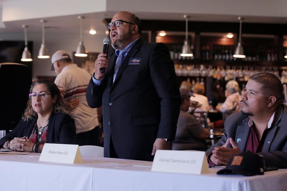 From left, democrats Gina Ortega, Ruben Reyes, and Daniel Sambrano debate during the Picacho Hills County Club forum on May 17, 2022. The three candidates are running to become the next Doña Ana County Accessor.