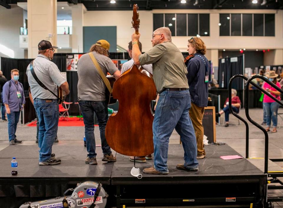 Bass player Todd Kirchner and members of Full Cord Bluegrass from Grand Haven, Michigan perform on Thursday, September 29, 2021 at the Raleigh Convention Center in Raleigh, N