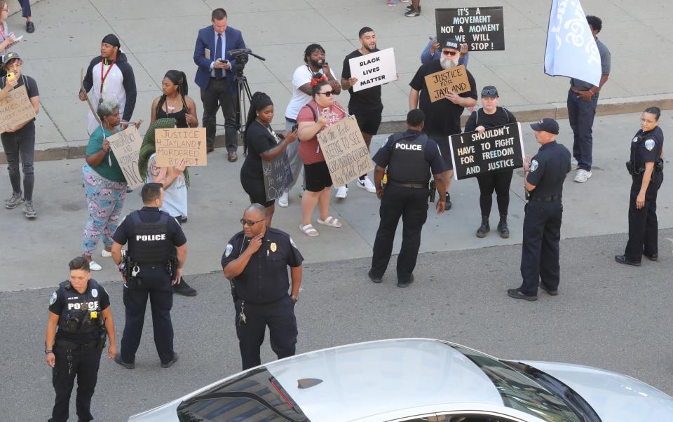 Protesters gather Thursday outside the Stubbs Justice Center in reaction to the Akron police-involved shooting death of Jayland Walker.