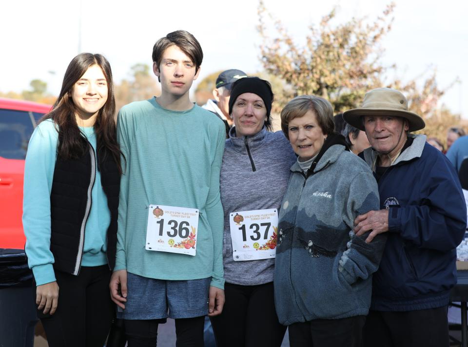 Family and friends came out to support Aidan Klonowski and Kristin Klonowski as they participated in the 18th Annual Turkey Day 5K sponsored by Gold's Gym and Fleet Feet on Thursday, November 24, 2022, in Jackson, Tennessee.  Over 600 runners participate in the event each year which is held to benefit the Regional Inter-faith Association (RIFA).