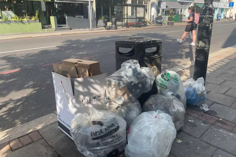 Bags of rubbish were left waiting to be picked up next to bins in Putney when MyLondon visited