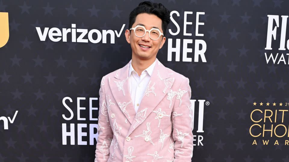 “Beef” creator Lee Sung Jin wore a playful baby pink suit embroidered with ballerinas, as well as a pair of Maison Margiela Tabi leather loafers. - Gilbert Flores/Variety/Getty Images