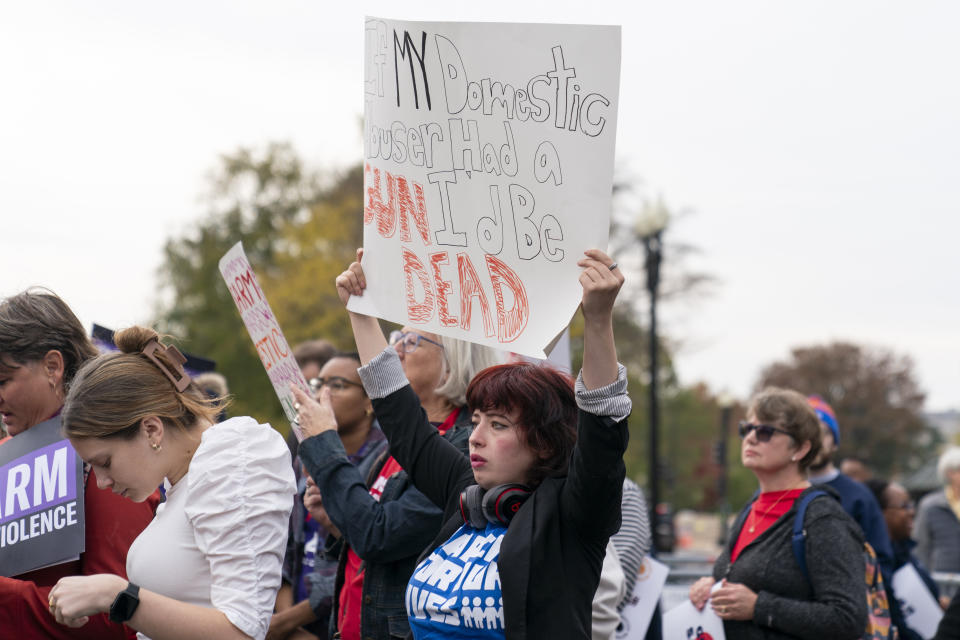 Gun safety and domestic violence prevention organizations gather outside of the Supreme Court before oral arguments are heard in United States v. Rahimi, Tuesday, Nov. 7, 2023, in Washington. (AP Photo/Stephanie Scarbrough)