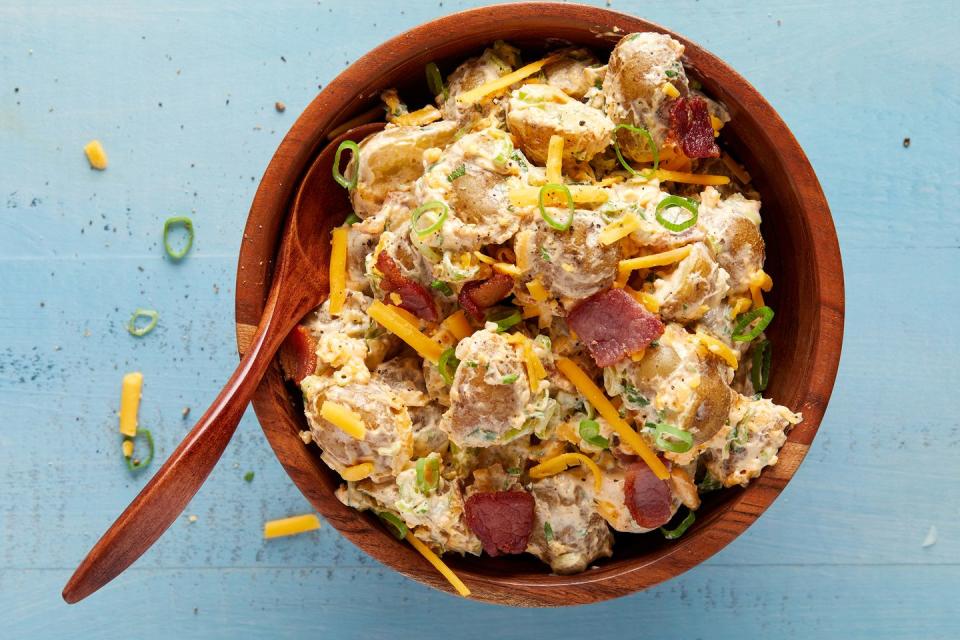 <p>Imagine a <a href="https://www.delish.com/cooking/recipe-ideas/recipes/a43853/loaded-baked-potatoes-bacon-cheddar-recipe/" rel="nofollow noopener" target="_blank" data-ylk="slk:loaded baked potato;elm:context_link;itc:0;sec:content-canvas" class="link ">loaded baked potato</a> and <a href="https://www.delish.com/entertaining/g2360/potato-salad-recipes/" rel="nofollow noopener" target="_blank" data-ylk="slk:potato salad;elm:context_link;itc:0;sec:content-canvas" class="link ">potato salad</a> coming together to make the ultimate year-round side, and you’ve pretty much got it. Complete with crispy bacon, scallions, and cheddar cheese, this potato salad will have you thinking you’re in your favorite steakhouse.</p><p>Get the <strong><a href="https://www.delish.com/cooking/recipe-ideas/a40191244/loaded-baked-potato-salad-recipe/" rel="nofollow noopener" target="_blank" data-ylk="slk:Loaded Baked Potato Salad recipe;elm:context_link;itc:0;sec:content-canvas" class="link ">Loaded Baked Potato Salad recipe</a></strong>.</p>