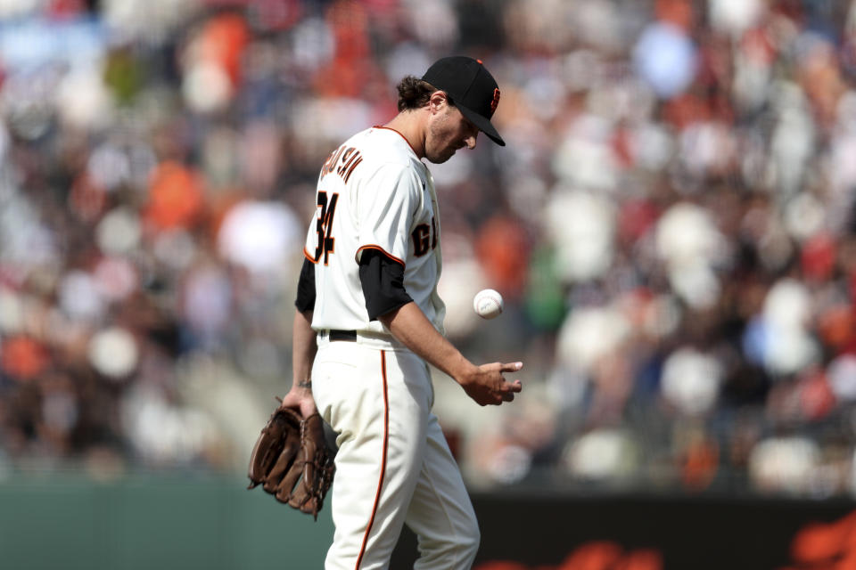 San Francisco Giants' Kevin Gausman reacts after a triple hit by St. Louis Cardinals' Matt Carpenter during the seventh inning of a baseball game in San Francisco, Monday, July 5, 2021. (AP Photo/Jed Jacobsohn)