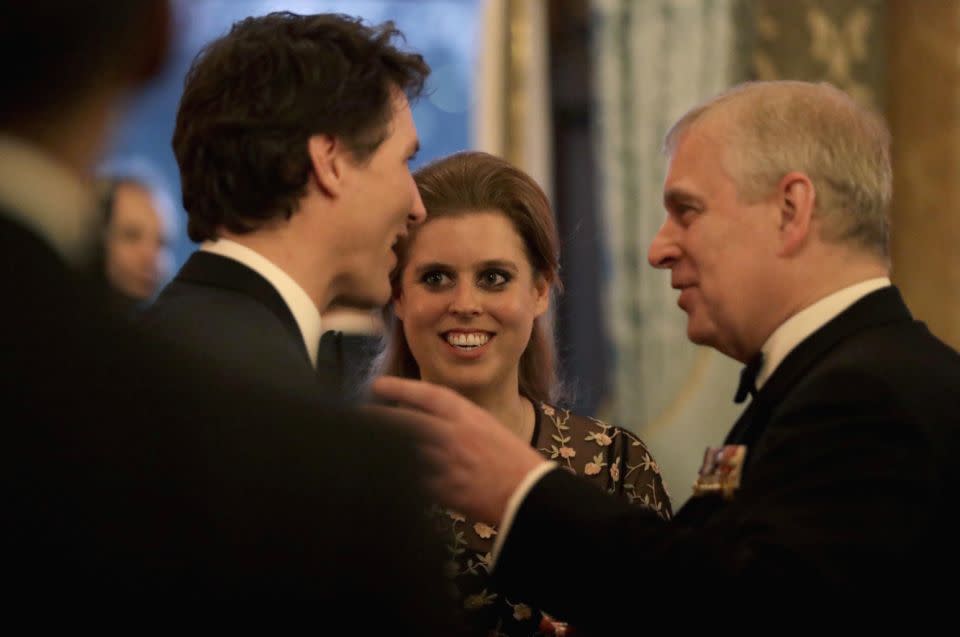 She was pictured having a chat with the Canadian Prime Minister and her dad, Prince Andrew. Photo: Getty Images