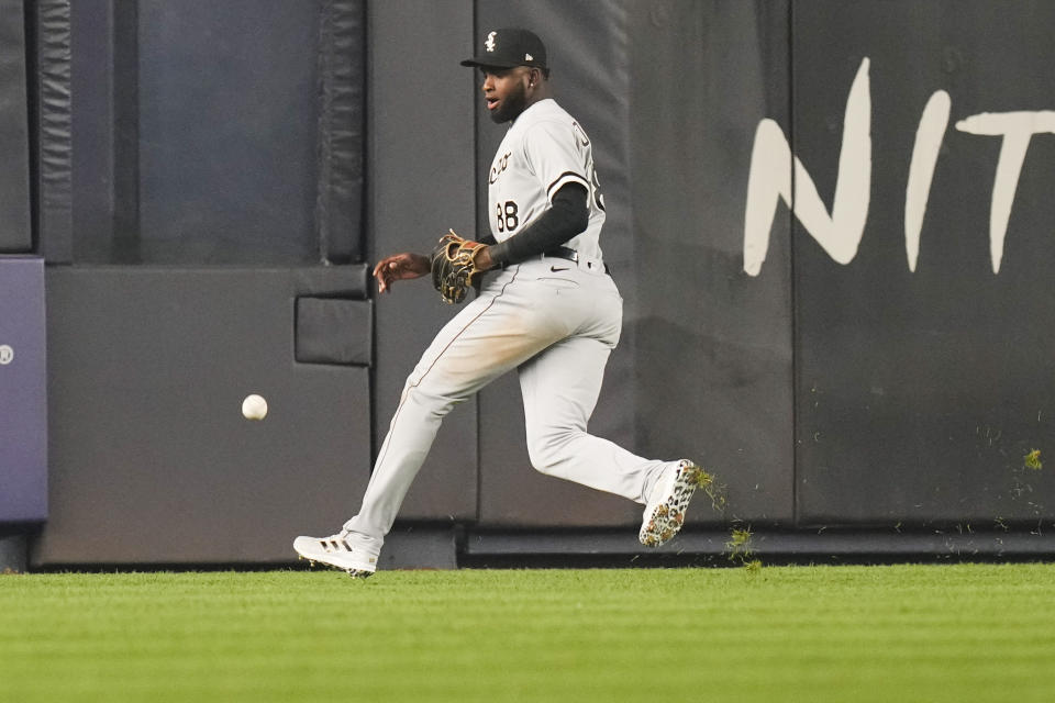 Chicago White Sox's Luis Robert Jr. (88) chases a ball hit by New York Yankees' Isiah Kiner-Falefa for an RBI double during the seventh inning of a baseball game Tuesday, June 6, 2023, in New York. (AP Photo/Frank Franklin II)