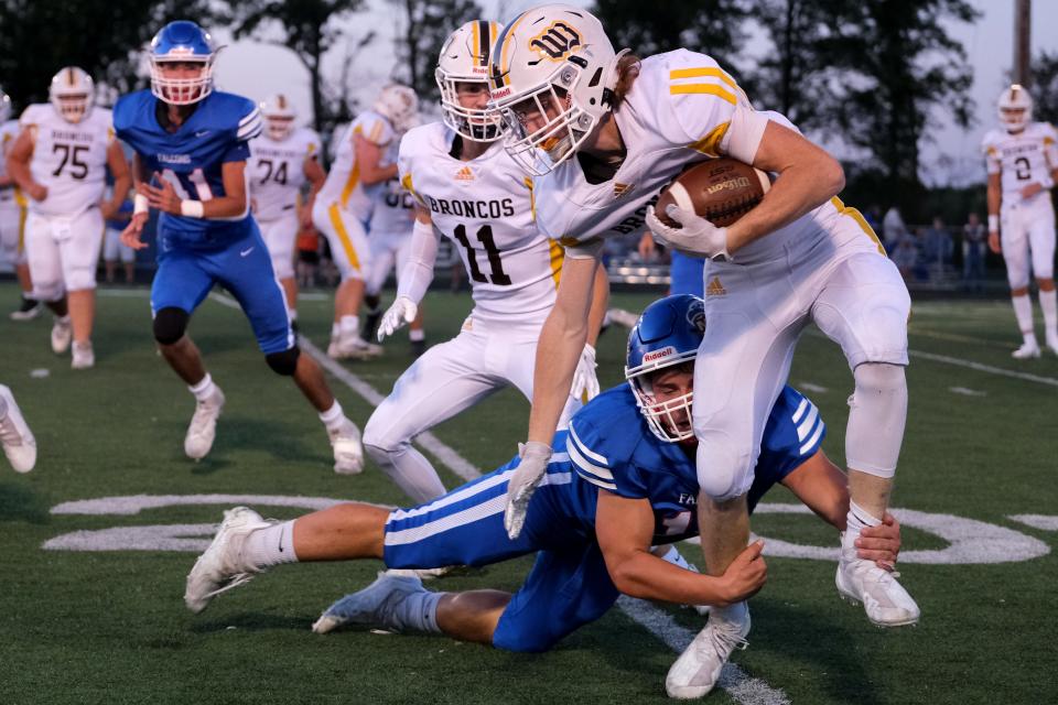 Western Brown quarterback Drew Novak (2) rushes the ball during the first quarter of the Southern Buckeye Athletic and Academic Conference game against Clinton-Massie, Saturday, Oct. 1, 2021, at Clinton-Massie Football Field in Clarksville, Ohio.