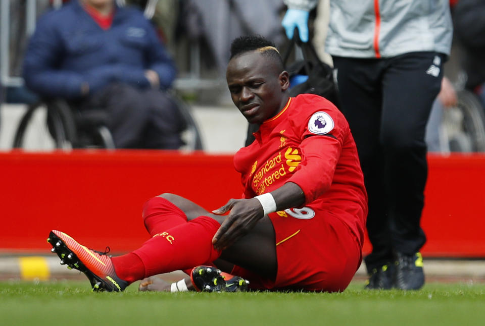 <p>Britain Soccer Football – Liverpool v Everton – Premier League – Anfield – 1/4/17 Liverpool’s Sadio Mane after sustaining an injury Reuters / Phil Noble Livepic EDITORIAL USE ONLY. No use with unauthorized audio, video, data, fixture lists, club/league logos or “live” services. Online in-match use limited to 45 images, no video emulation. No use in betting, games or single club/league/player publications. Please contact your account representative for further details. </p>