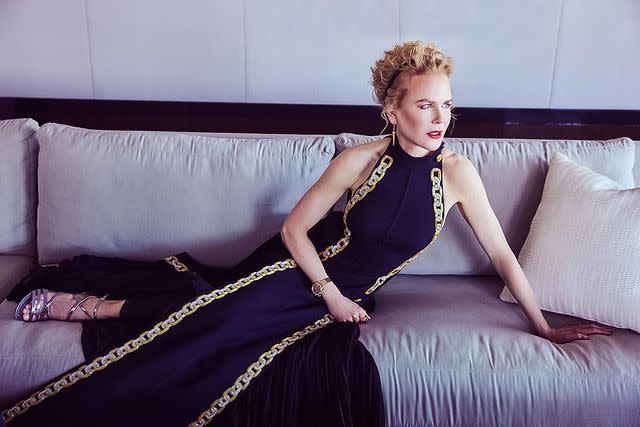 <p>Posing on her sofa at home, Nicole Kidman channelled her usual elegant style with a beautiful black gown by Louis Vuitton, which featured a high neck and delicate embroidery.</p><p><a href="https://www.instagram.com/p/CL3EE06pWhE/?utm_source=ig_embed&utm_campaign=loading" rel="nofollow noopener" target="_blank" data-ylk="slk:See the original post on Instagram;elm:context_link;itc:0;sec:content-canvas" class="link ">See the original post on Instagram</a></p>