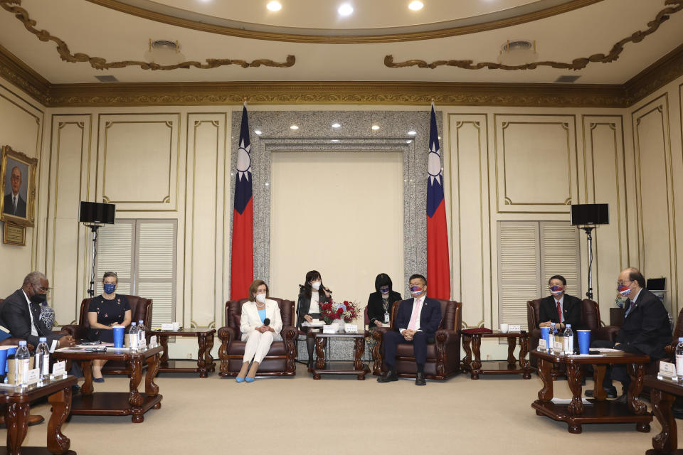 In this photo released by the Taiwan Legislative Yuan, U.S. House Speaker Nancy Pelosi, center left, and Legislative Yuan Deputy Speaker Tsai Chi-chang attend a meeting in Taipei, Taiwan, Wednesday, Aug. 3, 2022. Pelosi, meeting top officials in Taiwan despite warnings from China, said Wednesday that she and other congressional leaders in a visiting delegation are showing they will not abandon their commitment to the self-governing island. (Taiwan Presidential Office via AP)