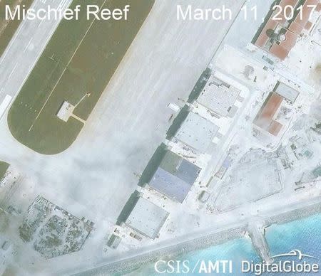 Construction is shown on Mischief Reef, in the Spratly Islands, the disputed South China Sea in this March 11, 2017 satellite image released by CSIS Asia Maritime Transparency Inititative at the Center for Strategic and International Studies (CSIS) to Reuters on March 27, 2017. MANDATORY CREDIT: CSIS/AMTI DigitalGlobe/Handout via REUTERS