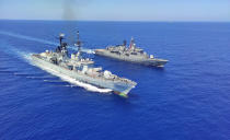 Italian destroyer ITS Durand De La Penne, left, along with Turkish frigates TCG Goksu and TCG Fatih conduct maritime trainings in the Eastern Mediterranean Tuesday, Aug. 25, 2020, to improve coordination and interoperability.(Turkish Defense Ministry via AP, Pool)